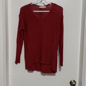 Long sleeve pink knit sweater with cable detail